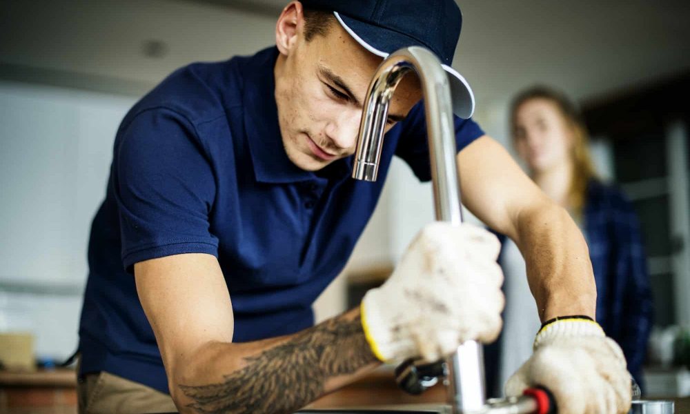 plumber-fixing-kitchen-sink-1.jpg